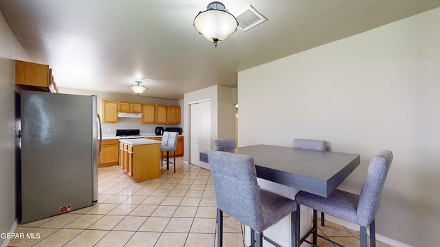 view of tiled dining area