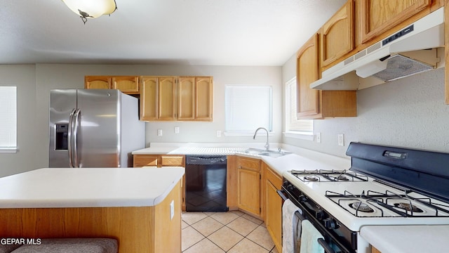 kitchen with light brown cabinets, sink, black appliances, and light tile floors