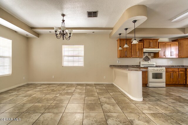 kitchen with decorative light fixtures, an inviting chandelier, a textured ceiling, white stove, and light tile floors