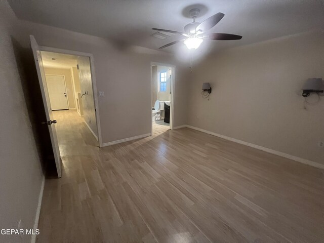 unfurnished room featuring wood-type flooring and ceiling fan