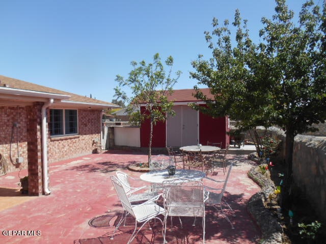 view of patio / terrace featuring an outdoor structure