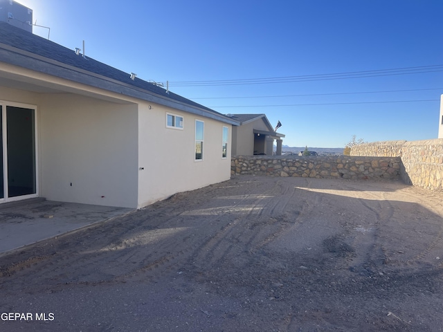 exterior space with a patio area