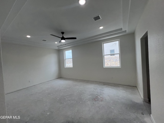 spare room featuring visible vents, concrete floors, baseboards, recessed lighting, and a ceiling fan