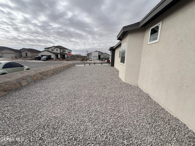 view of yard featuring a residential view