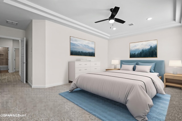bedroom with baseboards, visible vents, and carpet floors