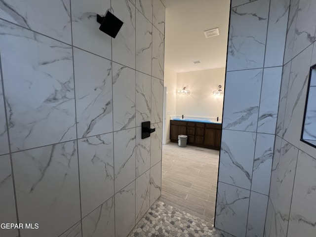 bathroom with walk in shower