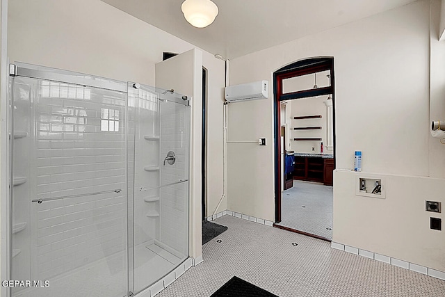 bathroom with an enclosed shower, tile flooring, and a wall mounted air conditioner