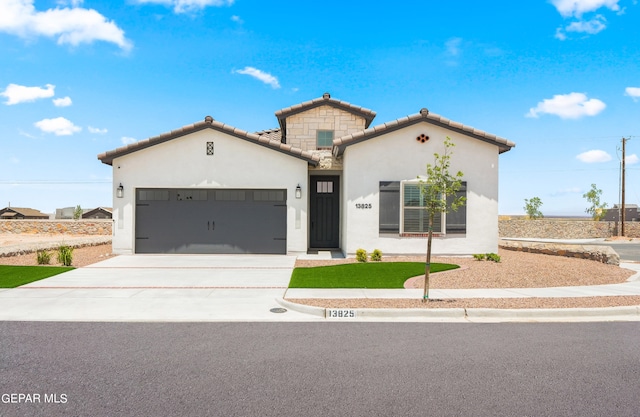 view of front of property featuring a garage