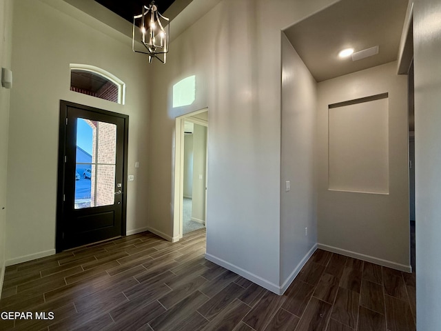 entryway with a notable chandelier