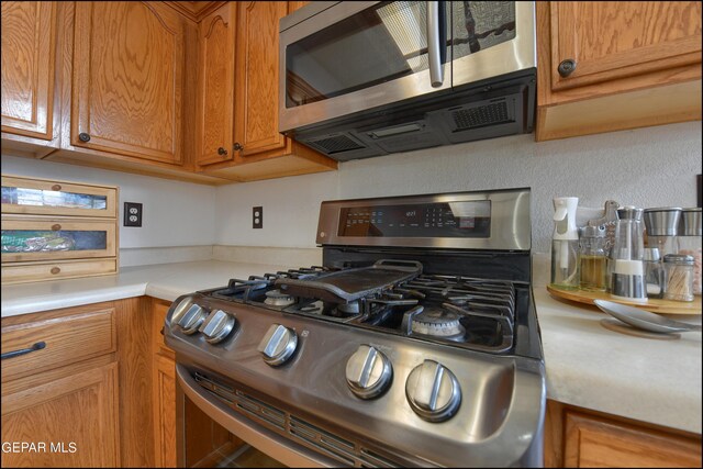 kitchen featuring appliances with stainless steel finishes