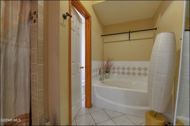 bathroom featuring a bathing tub and tile patterned floors