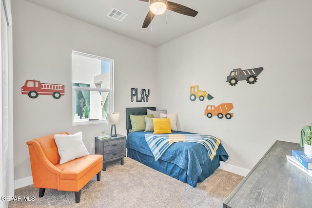 carpeted bedroom featuring ceiling fan