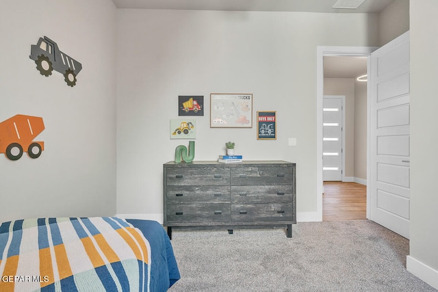 bedroom featuring carpet