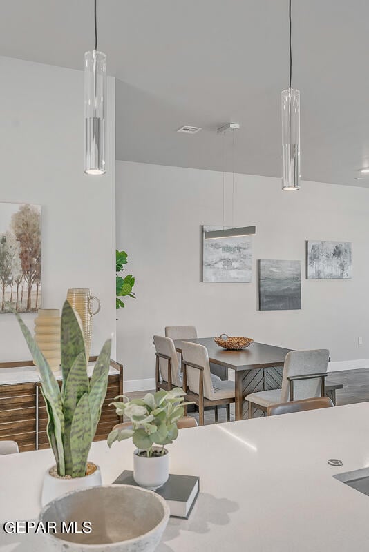 dining area with hardwood / wood-style flooring