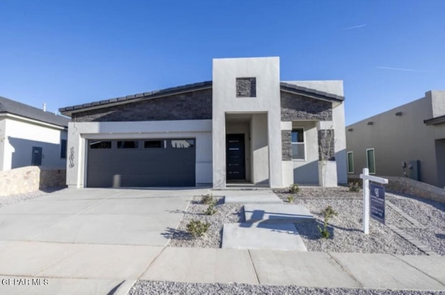 view of front of home with a garage