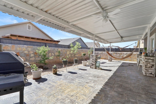 view of patio with ceiling fan