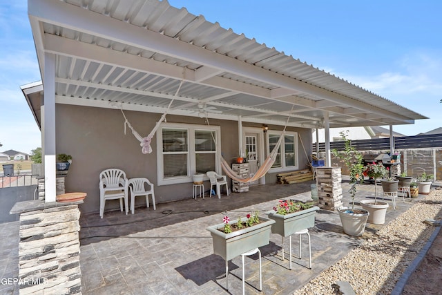 view of patio with ceiling fan