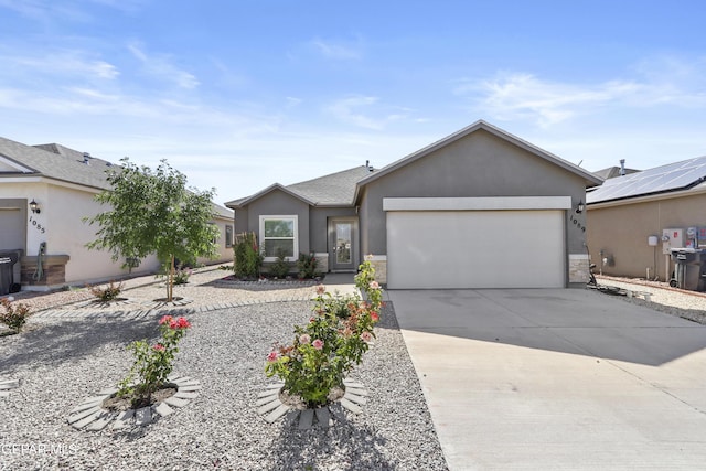 ranch-style house featuring a garage