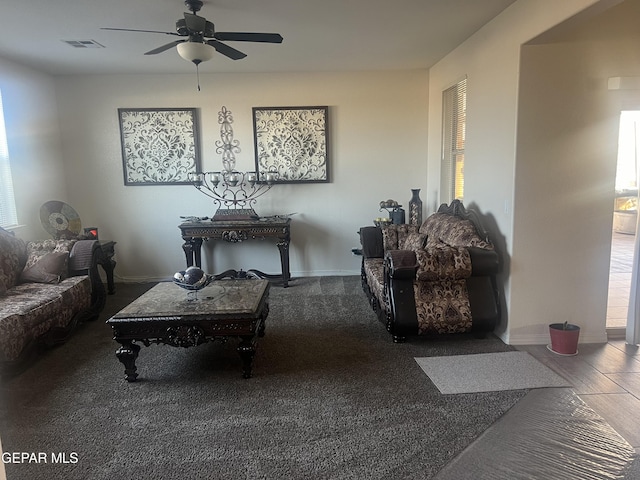 living room featuring ceiling fan