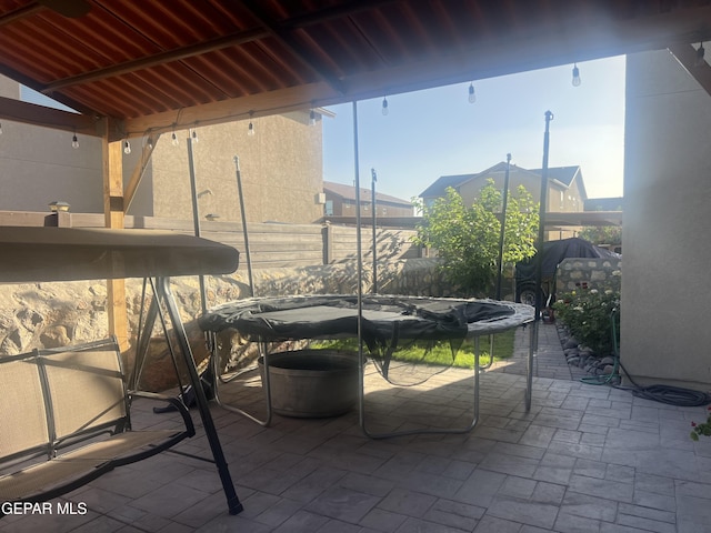 view of patio / terrace with a trampoline