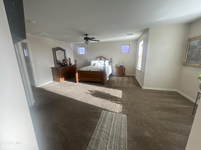 bedroom featuring ceiling fan and dark colored carpet