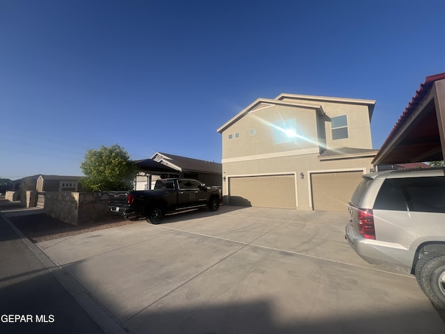 view of front of property with a garage