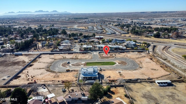 drone / aerial view featuring a mountain view