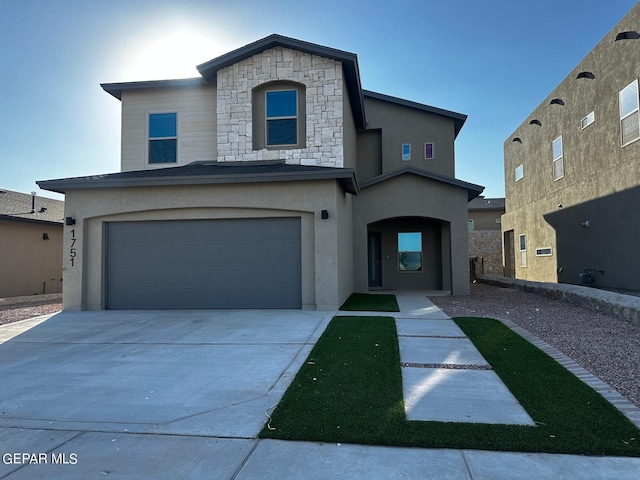 view of front of home with a garage