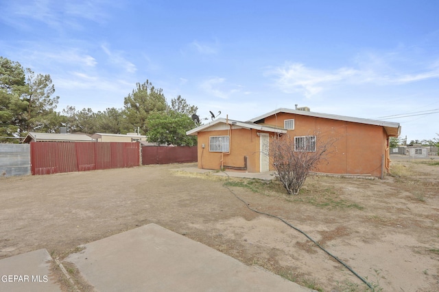 view of home's exterior with a patio area