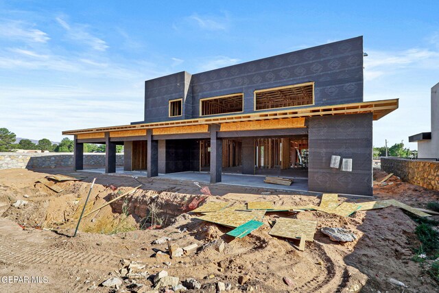 back of house featuring a patio