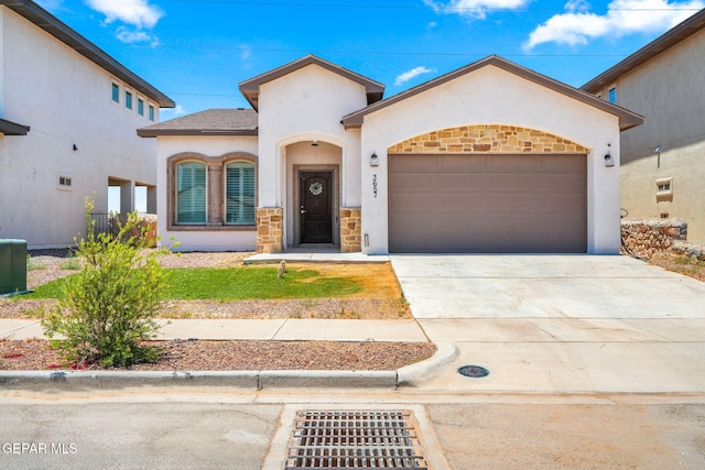 mediterranean / spanish house featuring a garage