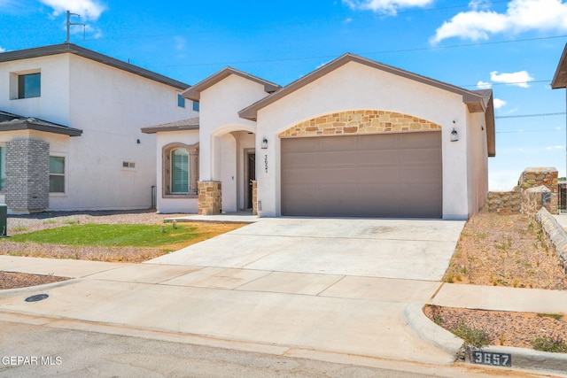 view of front of property featuring a garage