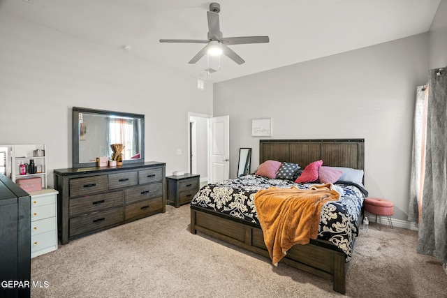 bedroom with light colored carpet and ceiling fan