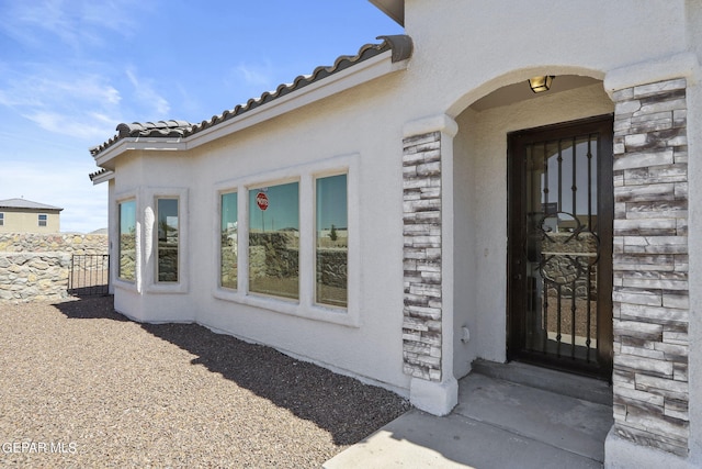 265 Adamtowne Dr, El Paso, TX 79928 - property entrance with stucco siding and stone siding