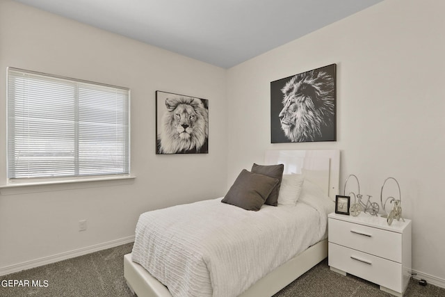265 Adamtowne Dr, El Paso, TX 79928 - bedroom with dark colored carpet and baseboards