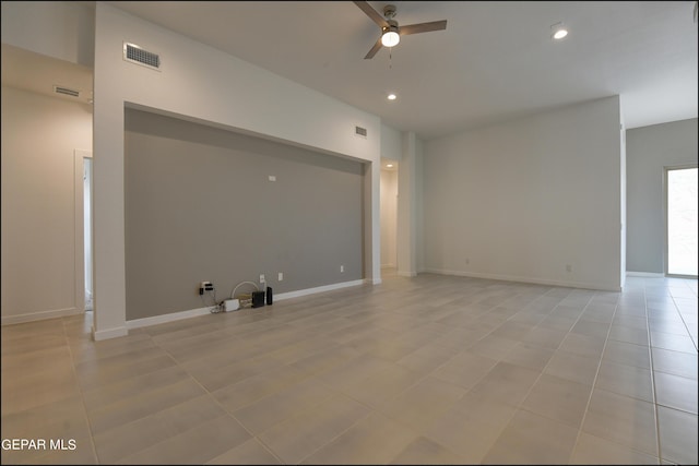 interior space featuring ceiling fan