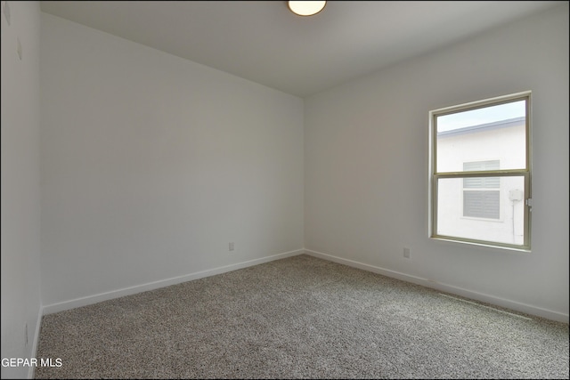 unfurnished room with carpet floors