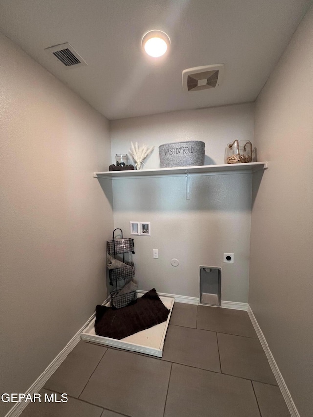 laundry room with washer hookup, visible vents, hookup for an electric dryer, tile patterned flooring, and laundry area