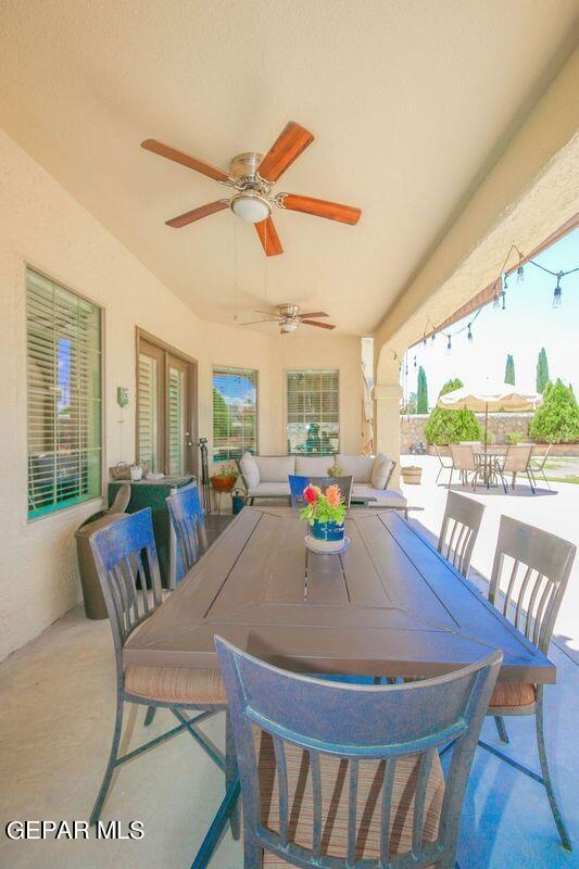 view of patio / terrace featuring ceiling fan