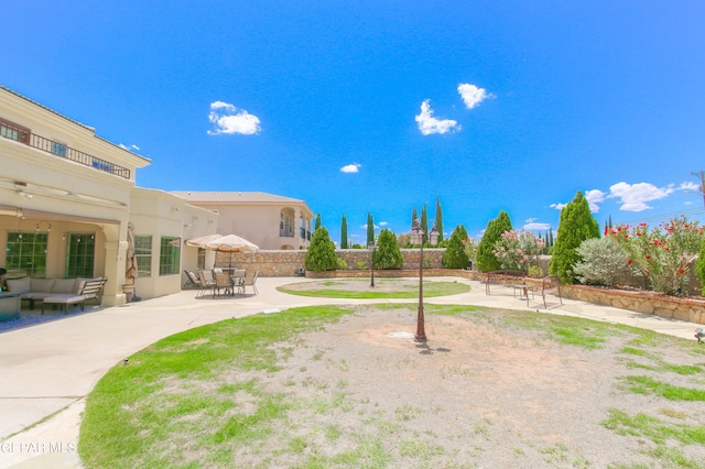 view of yard featuring a patio and an outdoor hangout area