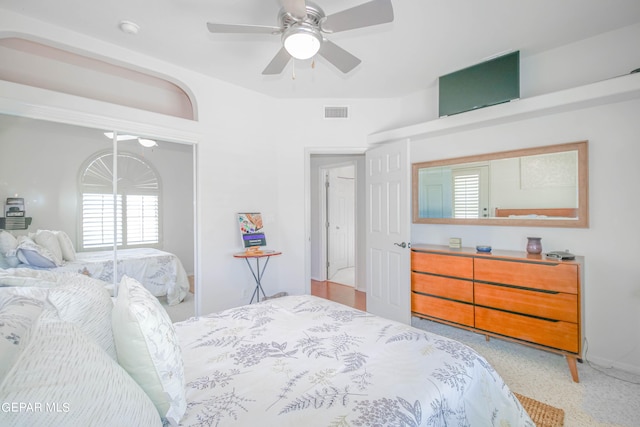 carpeted bedroom featuring ceiling fan