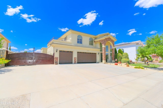 mediterranean / spanish-style house featuring a garage