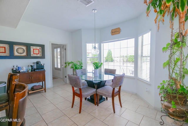 view of tiled dining space