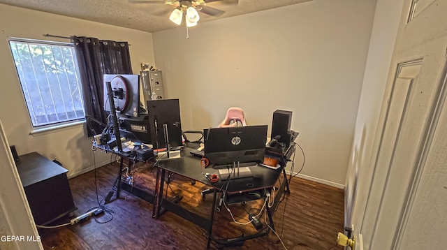 office space featuring a textured ceiling, dark hardwood / wood-style floors, and ceiling fan