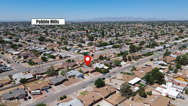 drone / aerial view featuring a mountain view