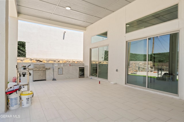 view of patio featuring exterior kitchen