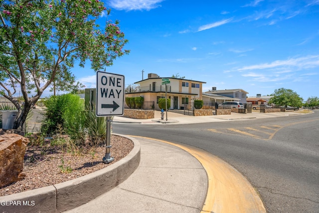 view of road featuring curbs and sidewalks