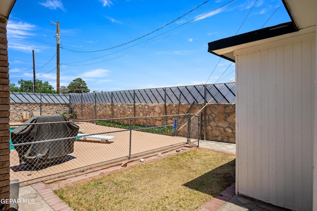 view of yard with a fenced backyard