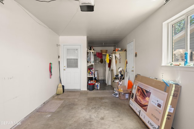 garage featuring a garage door opener