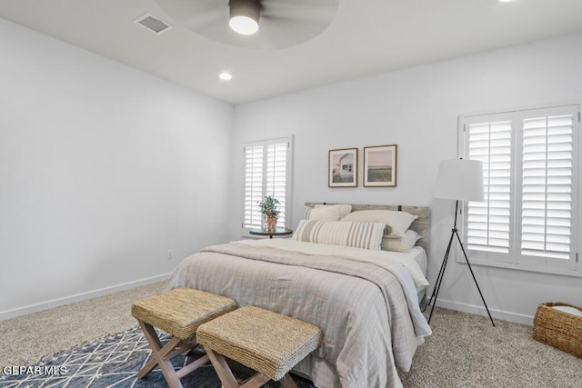 carpeted bedroom featuring ceiling fan